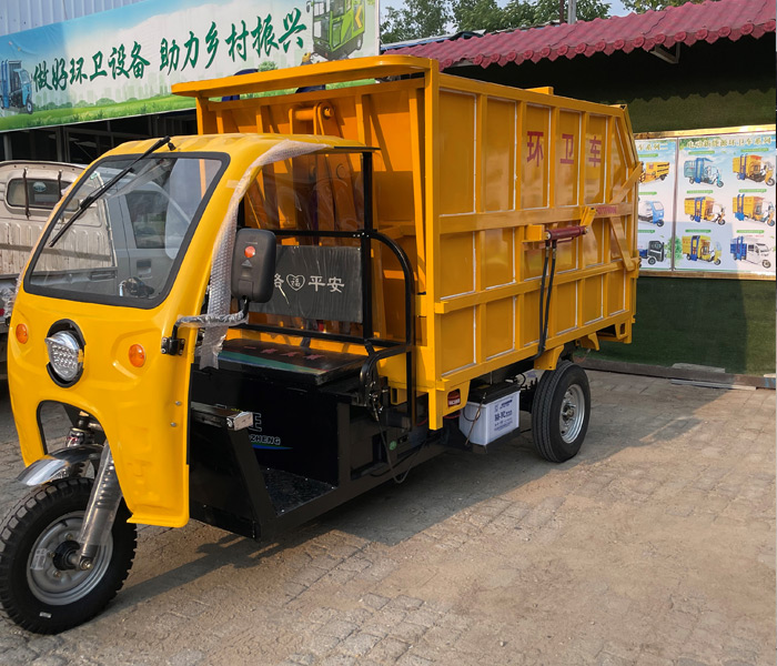 三輪電動(dòng)全推式壓縮垃圾車